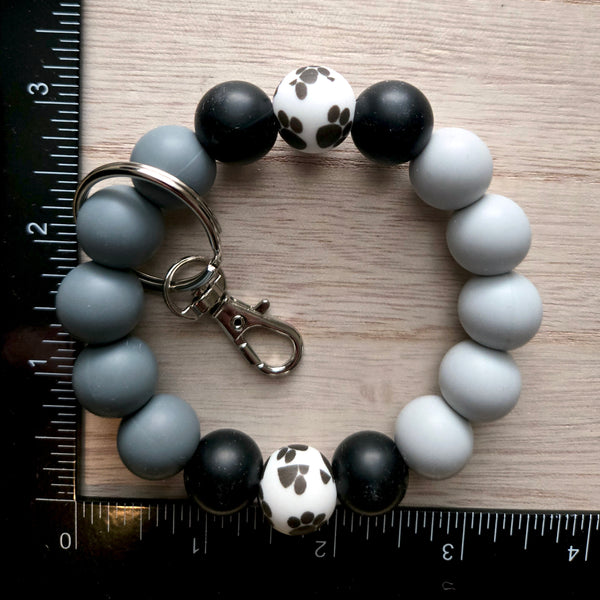 Wristlet Keychain - Silicone Beaded Key Fob Bracelet - Hands Free Keyring - Gray Black Paw Print & Gray Faux Leather Tassel