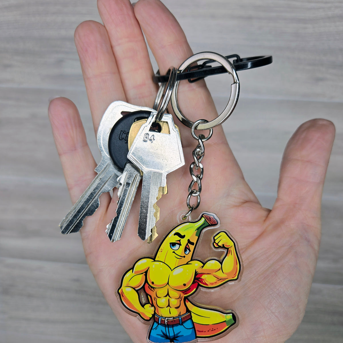 Flexing BroNana - 2" Double-Layered Clear Acrylic Keychain